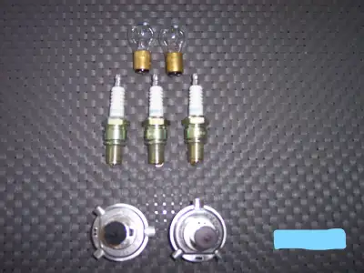 TOTAL PACKAGE - $30 2-NGK-BR9ES - $10 pair 1-NGK-BR8ES - $5 2-1157 12V Bulbs - $3 each 1-H4 12V 60/5...