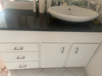 Bathroom cabinets, sink, countertop