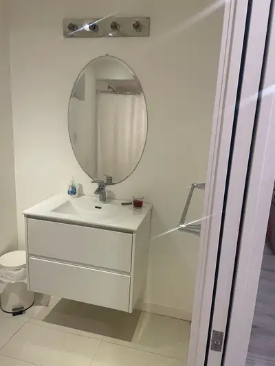 We are offering new basement( one bedroom plus den plus living room) for rent in our detached house...