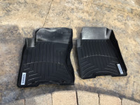 Nissan Rogue front fitted black rubber floor mats