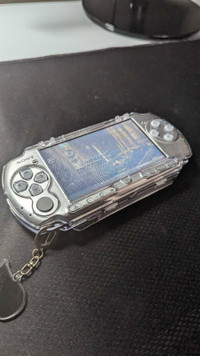 PSP 3001 (Silver & Modded) with a Protective Case and SD Adapter