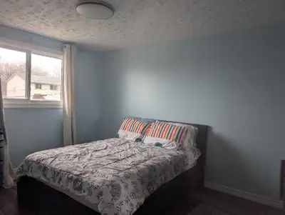 Two rooms available for rental. One is the master's bedroom in the photo (CAD 850/month) with queen...