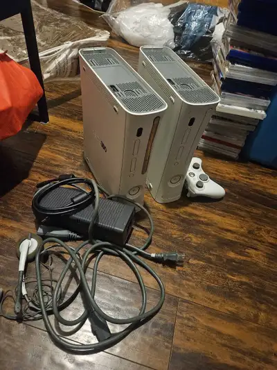 2 XBox 360s with controller and more..(Haven't tested them), View more