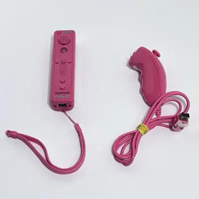 Get ready to wave goodbye to boredom with this vibrant pink Intec Wave Wii Remote and Nunchuk! This...