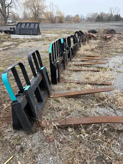 I'm selling a variety of used heavy equipment attachments, perfect for your construction or landscap...