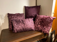 4 Purple throw pillows 
