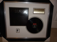COLLECTOR AC DC COMMEMORATIVE BACK IN BLACK ALBUM FRAMED AND NEW