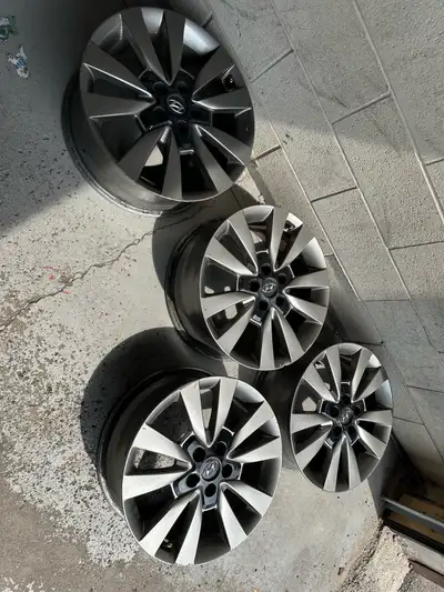 Like new Hyundai OEM 18 inch rims. Were previously on a Sonata for one season with 225 40 18 tires....