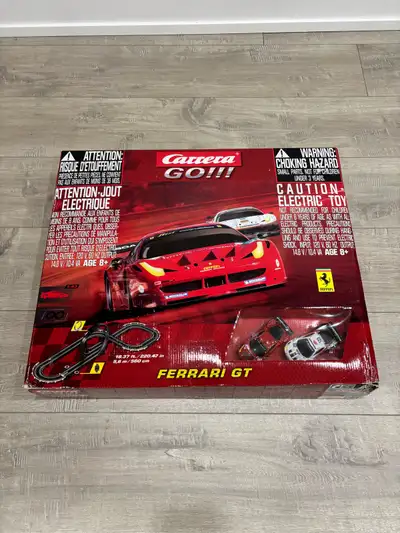 Get ready to race with this used Carrera GO!!! Rare Ferrari GT electric slot car racing set! The set...