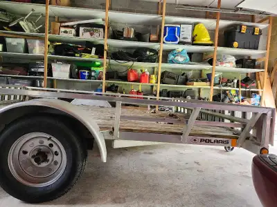 Polaris. Aluminum. Utility Trailer. 2015. Ownership on hand. Tool box, alot off ties down, 7 pin con...