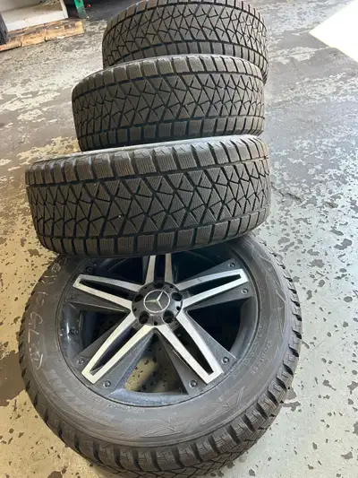 Selling a set of 4 rims with winter tires: Rims are OEM from a 2011 Mercedes-Benz GL350. 5x112 bolt...