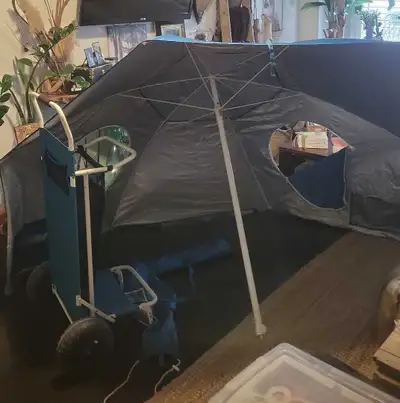 Get ready for some fun in the sun with this beach umbrella and cart combo! This item has been previo...