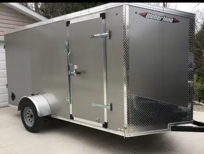 2025 Weber lane 6 x12 V Nose cargo trailer new condition.rear ramp door.Price is firm.