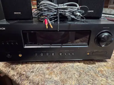 Denon Surround Sound System, including AVR-1312 receiver, 5 speakers, subwoofer, remote and audio ca...