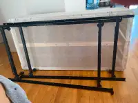 2 twins bed frames and box  spring like new.