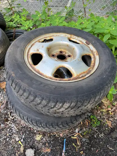 These Mintires Grip 60 Ice winter tires in size 225/65R17 are well-loved and show significant signs...