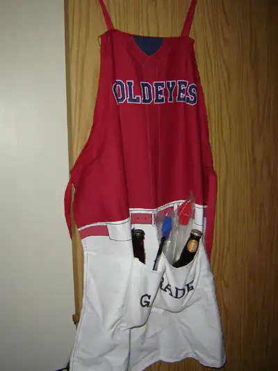 2 Winnipeg Goldeyes bib barbecue aprons. His and hers, or his and his, or hers and hers. Never used....