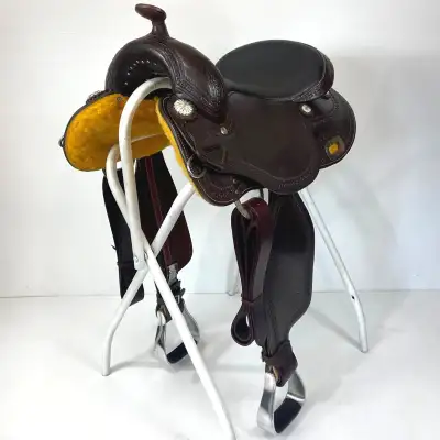 This classic trail saddle has comfort and style to match! With its premium dark brown leather and ha...
