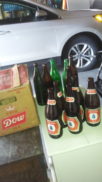 old empty  quart  beer bottles Dow