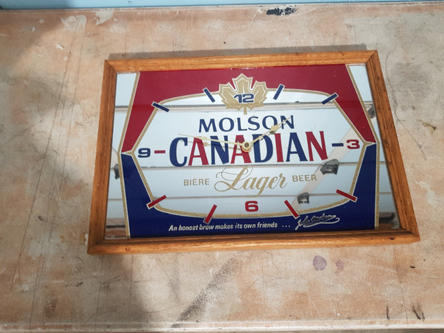 Molson Canadian mirror clock in Arts & Collectibles in Sarnia