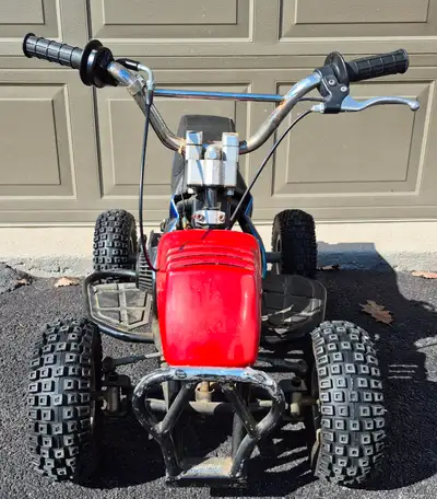 This is a small ATV for children under 60 pounds of weight. It has a pull start for a 2 Stroke engin...