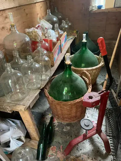 wine making equipment and bottles for $100, View more