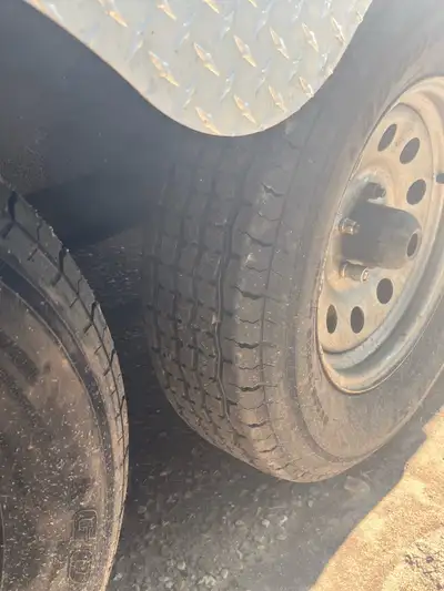 3500 lb spring axles, ramp rear door, new tires, interior light, new spare tire and one old spare ti...