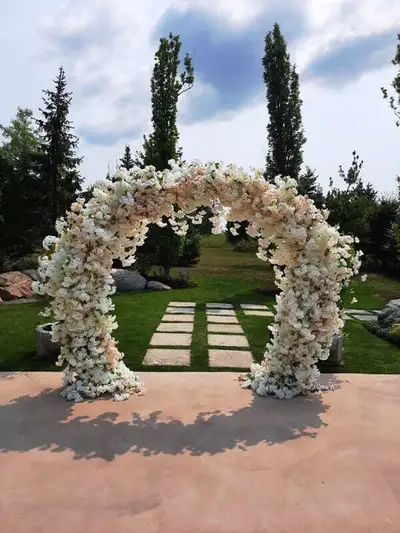 Rent our Circle cherry blossom moongate circle/round arbor/arch available in ivory, blush pink mix f...