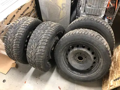 16 inch winter tires and rims off a 2021 honda civic, approximately 50% worn. 215/55/16 Toyo tires....