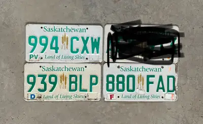 In WEYBURN $10 each SASKATCHEWAN plates , Private Vehicle, Dealer and Farm Ship 1 for $7, 2 for $8