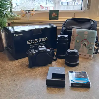 Canon EOS R100 Mirrorless Camera w/ 18-45mm and 55-210 mm Lenses, View more