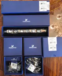 Swarovski set: Earrings, pendant and bracelet. 