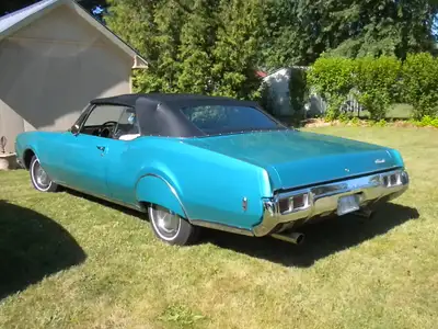 Putting ad online for a client. She has a 1968 Olds Delmont 88 Convertible that she wants to sell. 4...