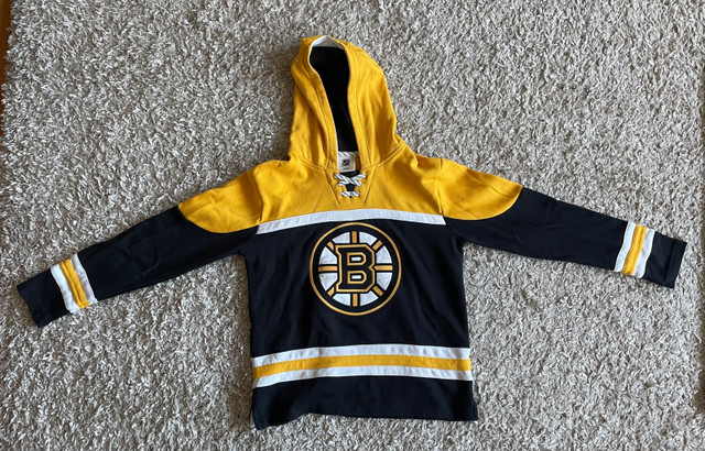 Boston Bruin clothing: 2 hoodies, 1 pair of pants (youth large,  in Hockey in Saskatoon