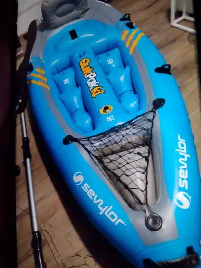 Sevylor back packer inflatable kayak. New in box. Never used. Fits in a backpack. Quick inflater/def...