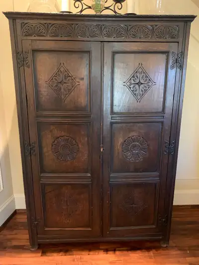 Carved oak armoire , View more