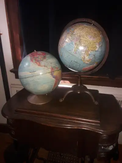 One with antique stand ( I think is bronze) is $50. The other is $20. Or both for $60. Both are 12 i...