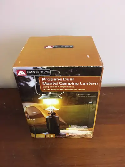 OZARK TRAIL propane dual mantle camping lantern. New in box. $40. Pick up on County Road 15, Prince...