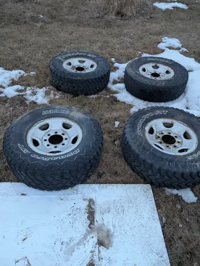 Square body Chevy tires and rims. Asking 200 or best offer. Verry little weather damage. Interested...