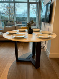 Marble and dark wooden base dining table