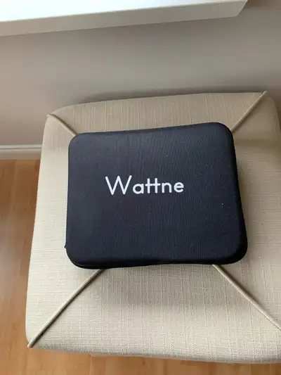 Wayne W1 handheld percussion massage gun known for its deep tissue relief.