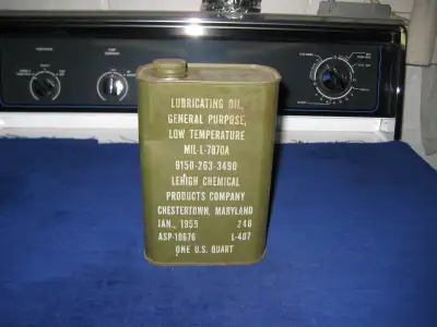 Vintage US Army military issue oil can one quart dated January 1955. Military green colour. Measures...