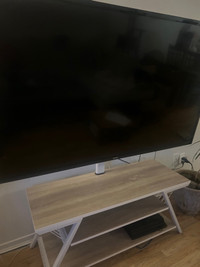 67 inch  Samsung TV on stand 