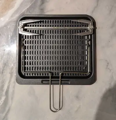 Non-stick oil/dripping tray x 1 Non-stick cooking tray x 2 Stainless steel rotisserie fork and handl...