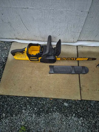 Dewalt 16" chainsaw, three batteries and two chargers. Used very little ,