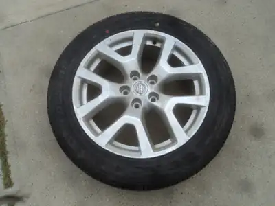 1 Dunlop tire with alloy rim is for sale. Tire is 225/55/18. Rim is 5 holes, 4.5 inch or 114.3 mm bo...