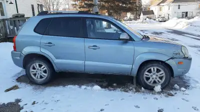 2006 Tuscon Car for Sale Has sunroof, heated seats, drives and runs. Heat and AC work V6- All wheel...
