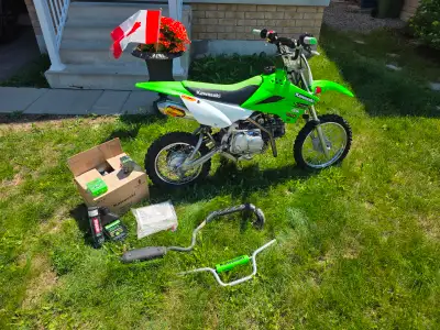 Kawasaki 110L (R) $2250 Lightly used, 2 owners, kids are no longer interested, over $1000 in extras,...