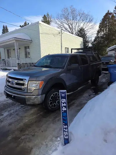 Ford f150 4x4 2013 avec 198000 km air climatisé bons pneus 4 saisons avec flocons boite arrière pouv...