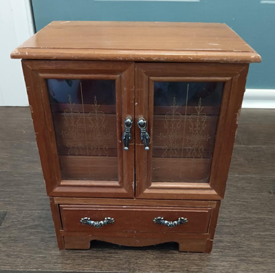 Vintage 1980s Wood Desktop Jewelry Cabinet / Armoire It features double front doors with gold etched...